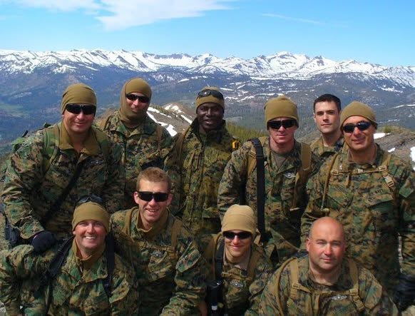 Mark Nicolas with fellow service members during Mountain Warfare Training in 2010